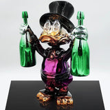 Billionaire Duck Dekoratif Ördek Biblo – Mor 40 cm, dolar gözlü, iki yeşil şişe tutan krom heykel.