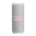 JBL Grip beyaz taşınabilir Bluetooth hoparlör, kumaş dokulu gövdesi ve turuncu çerçeveli logosuyla önden görünüm.